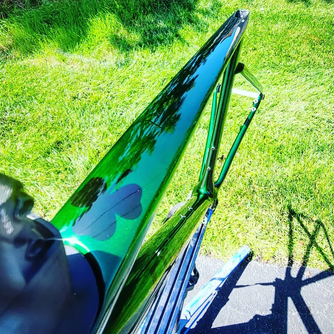 Easy bike paint design: deep candy green Specialized SL7 road frame with a shamrock graphic under gloss clear