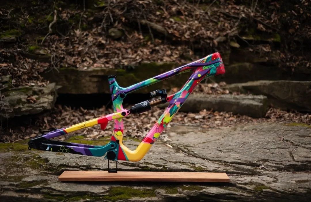 Mountain bike paint design: Nukeproof Forbes full suspension enduro frame in an abstract multi-color scheme